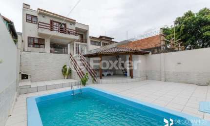 Casa com 4 quartos à venda na Rua Paul Harris, 130, Jardim Itu Sabará, Porto Alegre, 245 m2 por R$ 1.450.000