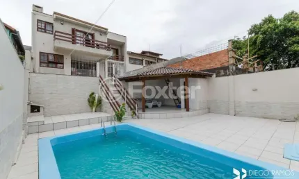 Casa com 4 quartos à venda na Rua Paul Harris, 130, Jardim Itu Sabará, Porto Alegre, 245 m2 por R$ 1.450.000