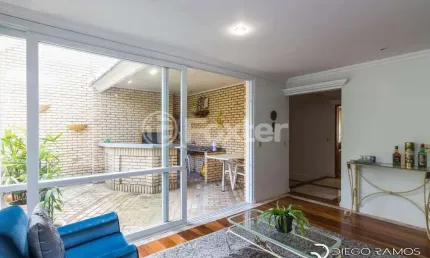Casa em condomínio fechado com 3 quartos à venda na Rua Doutor Arnaldo da Silva Ferreira, 450, Jardim Isabel, Porto Alegre, 322 m2 por R$ 1.300.000