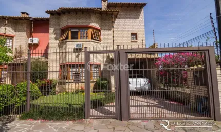 Casa com 3 quartos à venda na Rua Jacundá, 625, Guarujá, Porto Alegre, 180 m2 por R$ 650.000