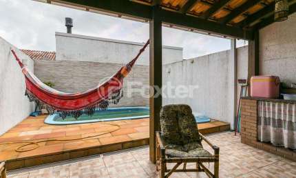 Casa em condomínio fechado com 3 quartos à venda na Avenida Edgar Pires de Castro, 2520, Hípica, Porto Alegre, 144 m2 por R$ 418.000