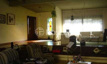 Casa com 4 quartos à venda na Rua Jacipuia, 201, Guarujá, Porto Alegre, 464 m2 por R$ 1.300.000