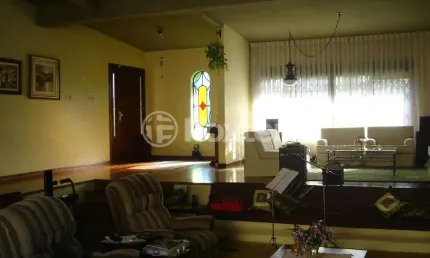 Casa com 4 quartos à venda na Rua Jacipuia, 201, Guarujá, Porto Alegre, 464 m2 por R$ 1.300.000