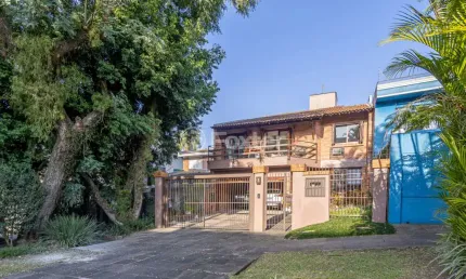 Casa com 4 quartos à venda na Rua Doutor Jorge Fayet, 21, Chácara das Pedras, Porto Alegre, 300 m2 por R$ 1.650.000