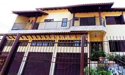 Casa com 4 quartos à venda na Rua Concorde, 258, Jardim Itu Sabará, Porto Alegre, 307 m2 por R$ 1.915.000