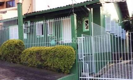 Casa com 3 quartos à venda na Rua Flor de Pessegueiro, 57, Vila Nova, Porto Alegre, 150 m2 por R$ 850.000