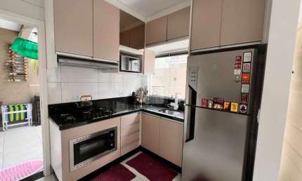 Casa em condomínio fechado com 3 quartos à venda na Rua Cyro Correia Pereira, 3588 02, Cidade Industrial, Curitiba por R$ 385.000
