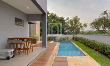 Casa à venda no Condomínio Tarumã, Santana de Parnaíba | 4 Quartos, Piscina e Área Gourmet