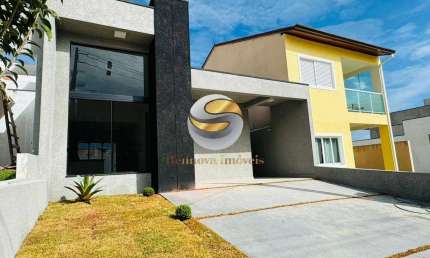 Casa térrea 03 dormitórios, pé direto alto, área gourmet integrada..