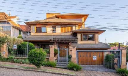 Casa com 4 quartos à venda na Rua Genny Zachia Stephanou, 43, Ipanema, Porto Alegre