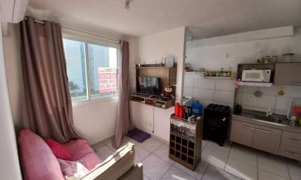 Apartamento Padrão 2 dormitórios com suíte MOBILIADO e DESOCUPADO com garagem e elevador