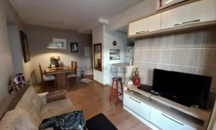 Apartamento Padrão 2 dormitórios SEMI MOBILIADO com suíte, sacada e garagem