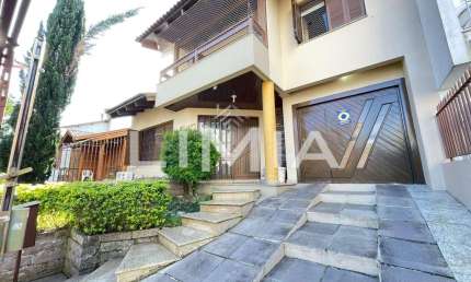 Casa com 4 quartos à venda na Rua Juruá, 105, Cristo Redentor, Porto Alegre, 366 m2 por R$ 1.290.000