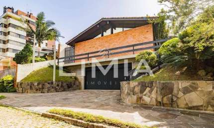 Casa com 4 quartos à venda na Travessa Java, 76, Jardim Lindóia, Porto Alegre, 480 m2 por R$ 1.095.000
