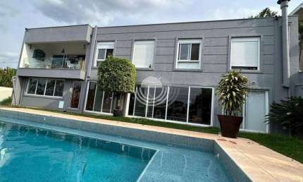 Casa com 5 dormitórios à venda, 402 m² por R$ 2.650.000,00 - Caminhos de San Conrado - Campinas/SP