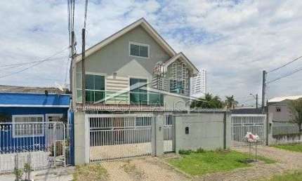 Casa em condomínio fechado com 3 quartos à venda na Rua Primo Lourenço Tosin, 100, Novo Mundo, Curitiba, 136 m2 por R$ 700.000