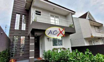 Sobrado com 3 dormitórios à venda, 141 m² por R$ 688.000 - Santa Cândida - Curitiba/PR