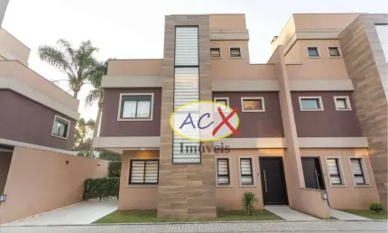 Sobrado com 3 dormitórios à venda, 163 m² por R$ 990.000,00 - Uberaba - Curitiba/PR