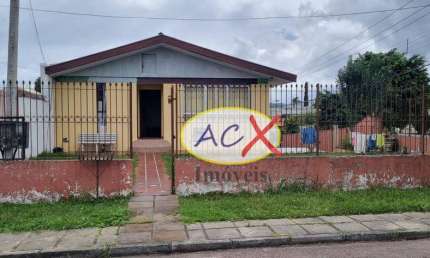 Casa com 3 dormitórios à venda, 306 m² por R$ 1.000.000,00 - Novo Mundo - Curitiba/PR