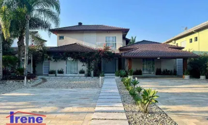 Sobrado com 5 suítes à venda, 649 m² por R$ 2.500.000 - Boungaiville - Peruíbe/SP