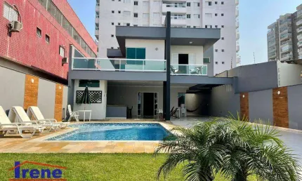 Casa pé na areia com 5 suítes à venda, 323 m² por R$ 2.700.000 - Centro - Itanhaém/SP