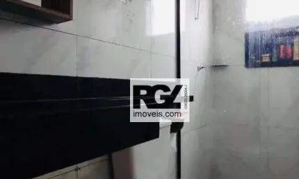 Sobrado triplex com 2 dormitórios à venda, 145 m² por R$ 580.000 - Vila Voturuá - São Vicente/SP