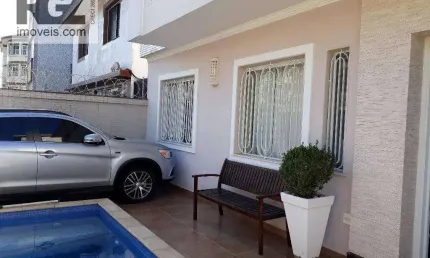 Sobrado com 4 dormitórios à venda, 280 m² por R$ 2.500.000,00 - Ponta da Praia - Santos/SP