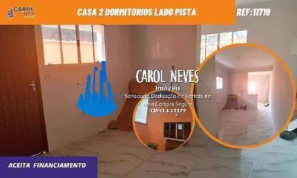 Casa 2 dormitorios lado pista financiamento bancario mongagua jussara