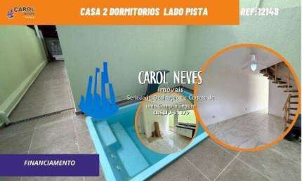 CASA SOBRADO 2 DORMITORIOS SUITE LADO PISTA FINANCIAMENTO MONGAGUA