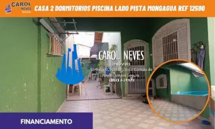 Casa 2 dormitorios piscina lado pista financiamento mongagua