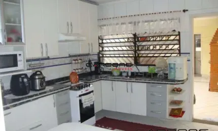 Casa com 3 quartos à venda na Rua Madrid, Parque Sevilha, São Paulo por R$ 1.200.000