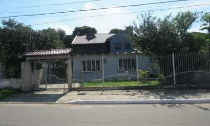 Casa com 3 quartos para alugar na Rua Adão Gonçalves, Olaria, Canoas, 200 m2 por R$ 2.200