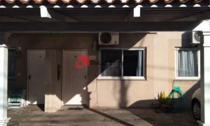 Casa em condomínio fechado com 2 quartos à venda na Rua Pistoia, Rio Branco, Canoas, 75 m2 por R$ 350.000