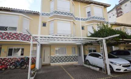 Casa em condomínio fechado com 3 quartos à venda no Marechal Rondon, Canoas , 150 m2 por R$ 690.000
