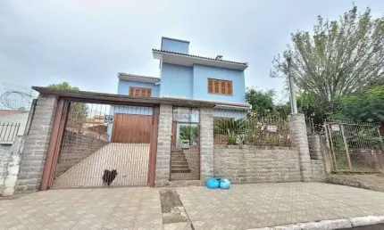 Casa com 3 quartos à venda na Rua Bolívia, --, São José, Canoas por R$ 850.000