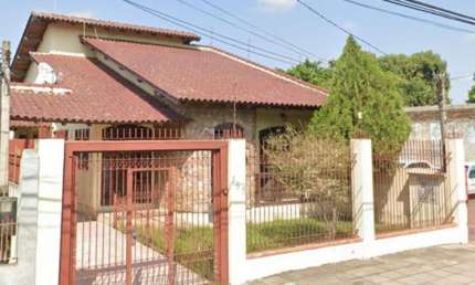 Casa com 4 quartos à venda no Marechal Rondon, Canoas , 385 m2 por R$ 690.000