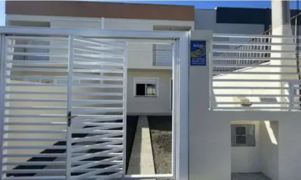 Casa em condomínio fechado com 2 quartos à venda na Rua Maricas, 141, Fátima, Canoas por R$ 399.000