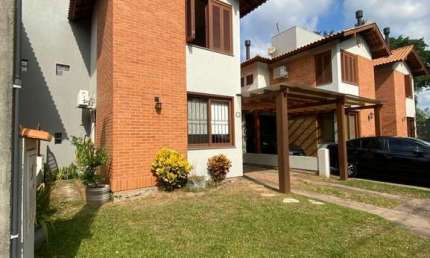 Casa em condomínio fechado com 3 quartos para alugar no Igara, Canoas 