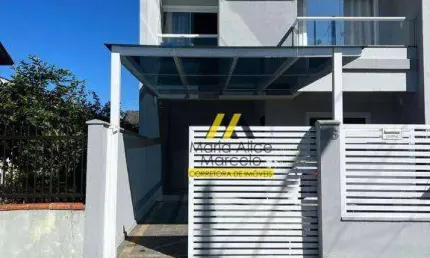 Sobrado geminado com 3 dormitórios à venda, 103 m² por R$ 549.000 - Iririú - Joinville/SC
