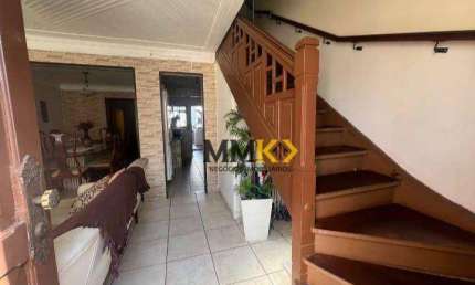 Casa com 3 dormitórios à venda, 122 m² por R$ 638.000,00 - Vila Matias - Santos/SP