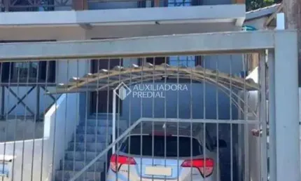 Casa em condomínio fechado com 2 quartos à venda na Rua Padre Hildebrando de Freitas Pedroso, 222, Tarumã, Viamão, 156 m2 por R$ 250.000