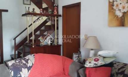 Casa em condomínio fechado com 3 quartos à venda na Rua Marciano Ribeiro, 43, Medianeira, Porto Alegre, 165 m2 por R$ 520.000