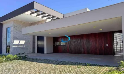 Casa Nova Térrea Alto Padrão Condomínio Villagio do Engenho A fachada é imponente com detalhes em pedra, vidro e Led 4 suítes 6 vagas Piscina