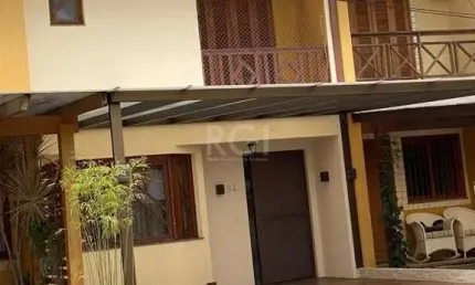 Casa com 3 quartos à venda na Avenida Edgar Pires de Castro, 1286, Hípica, Porto Alegre