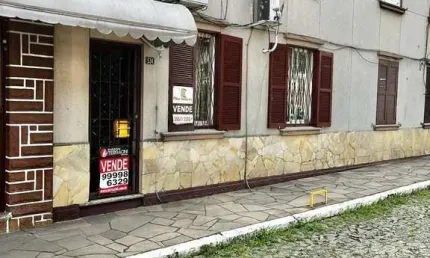 Vende-se apto térreo, com 03 dormitórios, sala com 02 ambientes