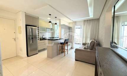 Apartamento mobiliado com 2 dormitórios para alugar em Santos