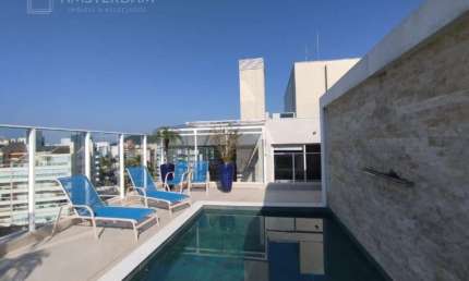 Residência exclusiva com 4 suítes e 3 vagas na Riviera de Bertioga: confira!