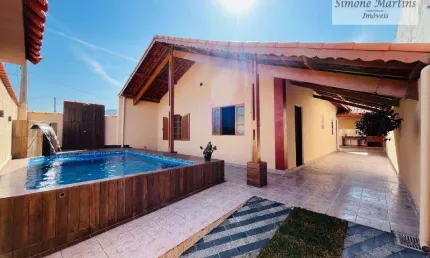 CASA EM LOTE INTEIRO,  COM PISCINA EM  MONGAGUA/SP ?????