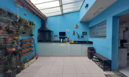 Sobrado com 3 dormitórios à venda, 111 m² por R$ 520.000,00 - Vila Scarpelli - Santo André/SP