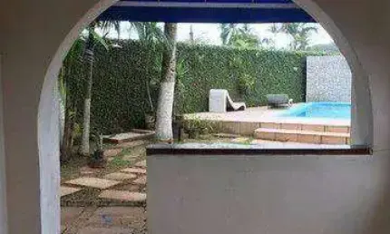 Sobrado com 5 dormitórios à venda, 260 m² por R$ 944.000,00 - Balneário Praia do Pernambuco - Guarujá/SP